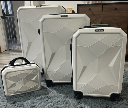 White and black travel luggage